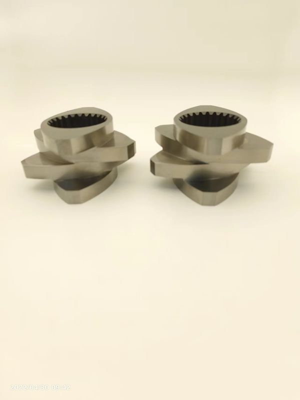 เครื่องผลักดันสกรูคู่ Elemenet Kneading Block Meshing Block ทนทานต่อการกัดกร่อนและสวม
